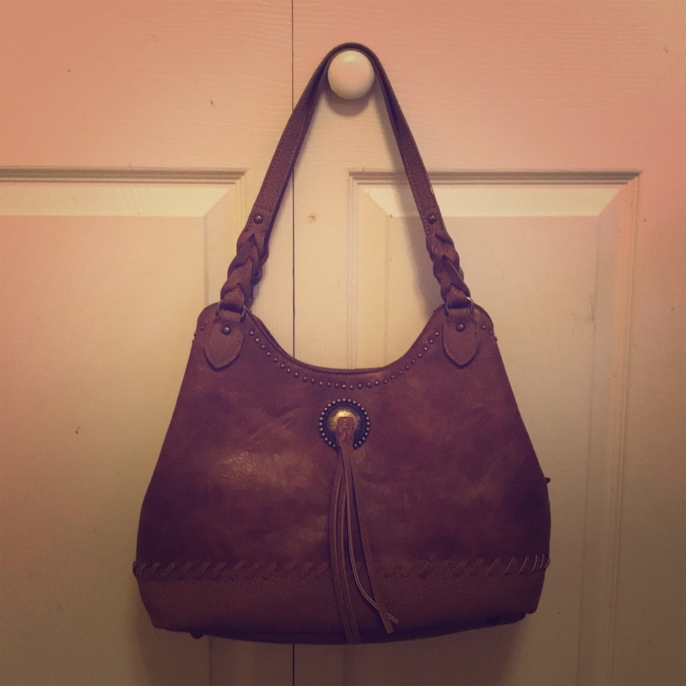 All leather 6 pocket handbag.